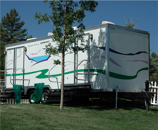 Image of trailer on top of grass